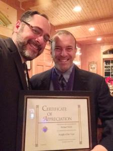 Chancellor Mike Walsh and Grand Knight Ray Iacovone take a selfie with the Knight of the Year Award. 