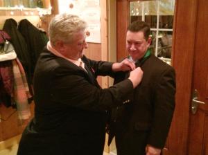 Former Membership Director Jim Cosgrove receives his Star Award pin from District Deputy Mike Walter  